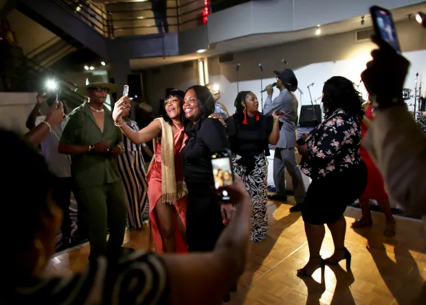 Guests celebrating and dancing at Kascades